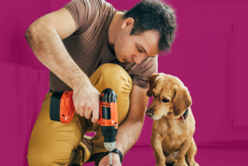 man remodeling with dog