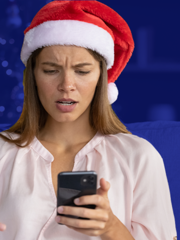 Woman holiday shopping on mobile phone