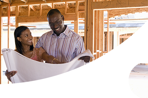 Couple looking at building plans