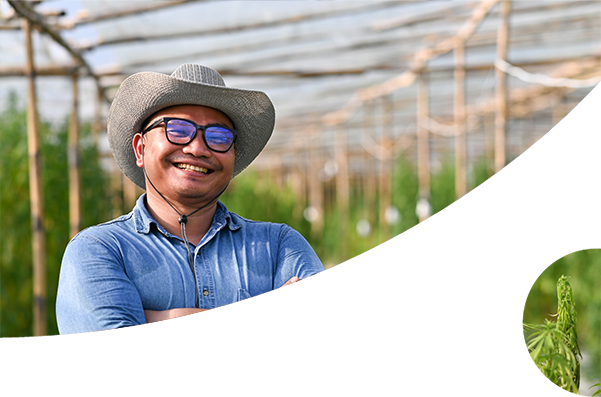 smiling male business owner in his field